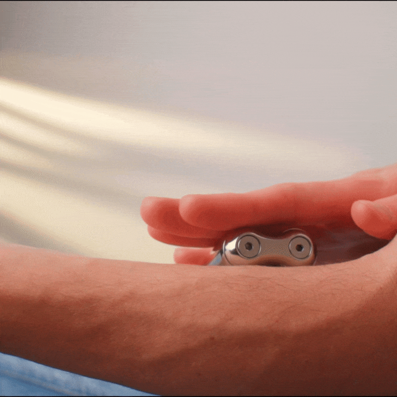 eam_Mini | ONO Roller Steel heavy weighted fidget toy in hand outdoors
