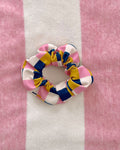 Photo of multi colored checkered hair scrunchie