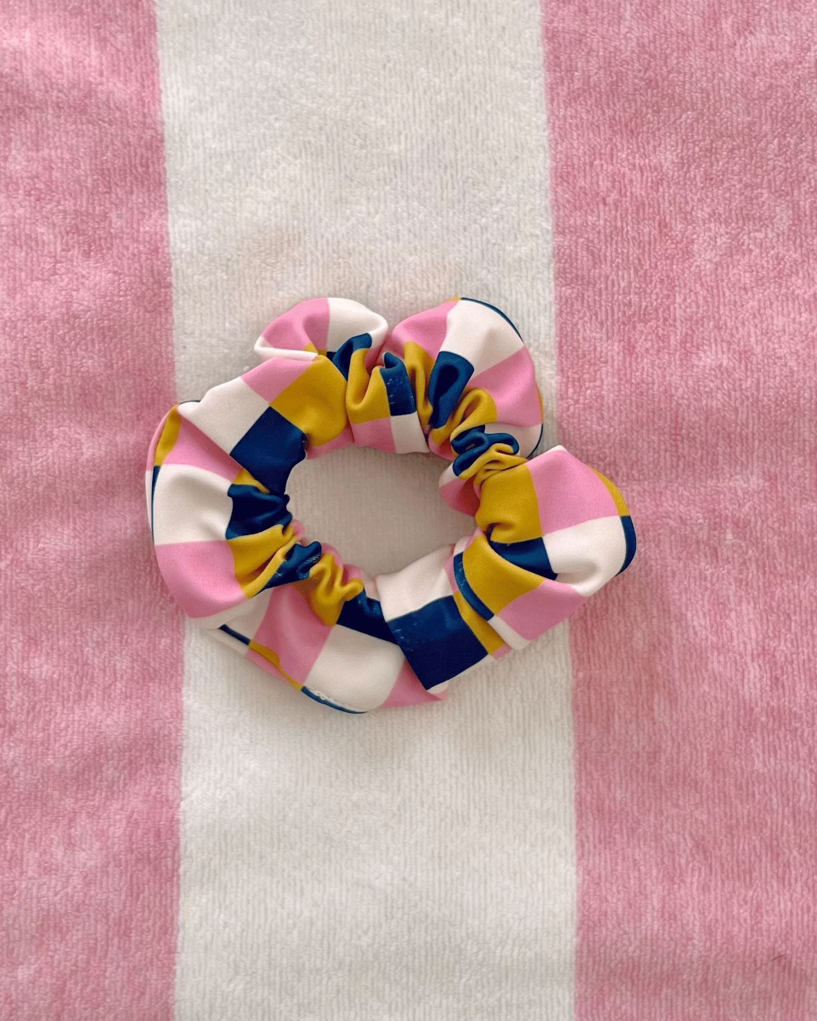 Photo of multi colored checkered hair scrunchie
